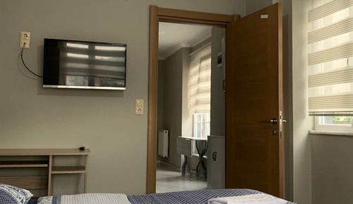 Habitación clásica doble, solo para hombres, baño compartido, vistas a la ciudad