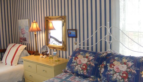 Habitación, varias camas, vistas al jardín