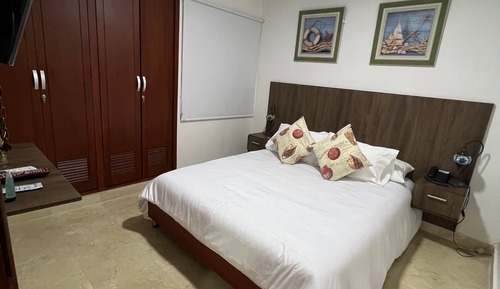 Habitación cuádruple familiar, 2 camas dobles, vistas al jardín