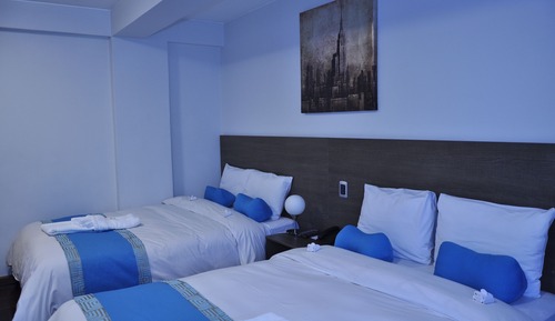 Habitación con 2 camas individuales