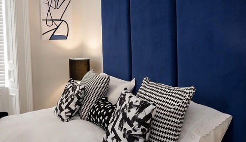 Habitación Deluxe con 1 cama doble o 2 individuales, baño privado