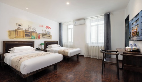 Habitación clásica con 2 camas individuales