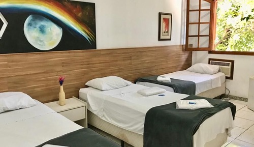 Habitación triple, varias camas
