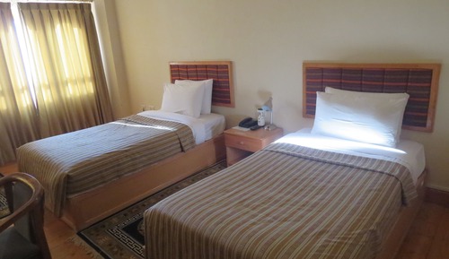 Habitación estándar con 1 cama doble o 2 individuales