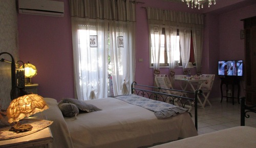 Habitación cuádruple, en la zona del jardín