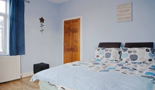 Habitación Deluxe con 2 camas individuales, baño compartido, vistas al jardín