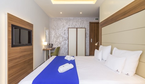 Habitación Confort con 1 cama doble o 2 individuales, vistas a la ciudad