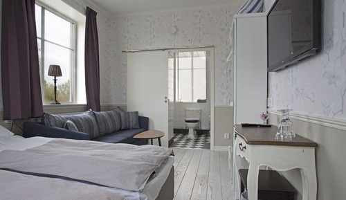 Habitación cuádruple económica, varias camas, vistas al campo de golf