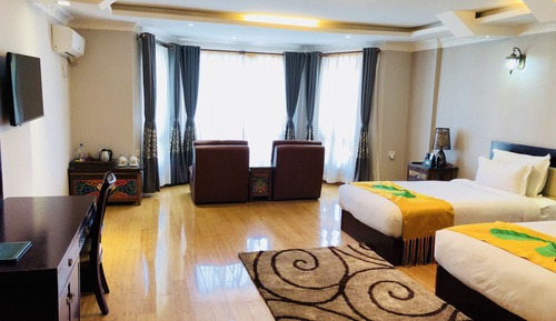 Habitación Deluxe con 1 cama doble o 2 individuales
