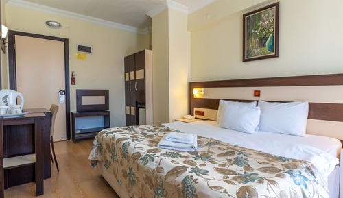 Habitación con 1 cama doble o 2 individuales, vistas a la ciudad