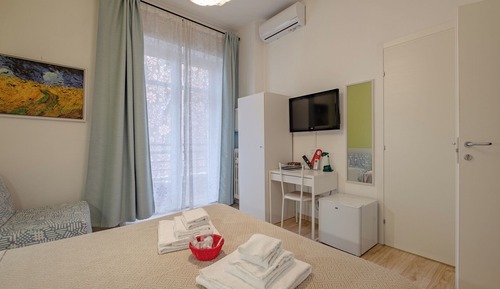 Habitación triple, balcón