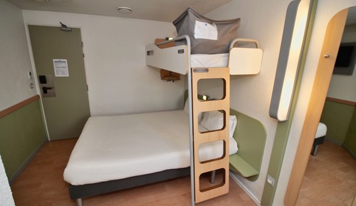 Habitación triple, varias camas