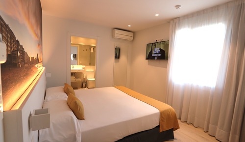 Habitación Business con 1 cama doble o 2 individuales