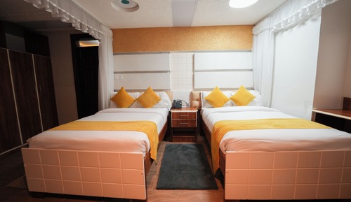 Habitación Confort con 1 cama doble o 2 individuales