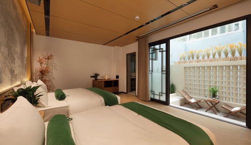 Habitación Signature con 2 camas individuales, vistas al jardín