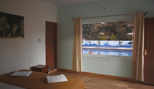 Classic Quadruple Room, Patio, Pool View