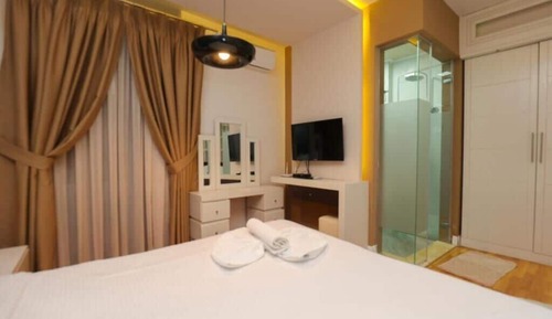 Habitación triple Deluxe