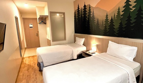 Habitación con 2 camas individuales, vistas a la ciudad