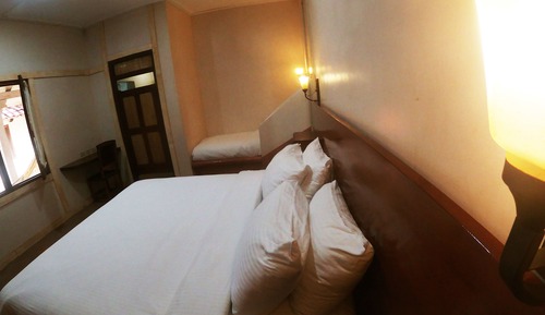 Habitación triple Signature, 1 cama de matrimonio grande, en la zona del jardín