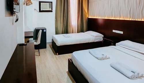 Habitación triple Deluxe