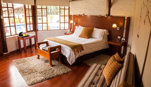 Habitación Deluxe, 1 cama de matrimonio grande, vistas al jardín, junto a la piscina