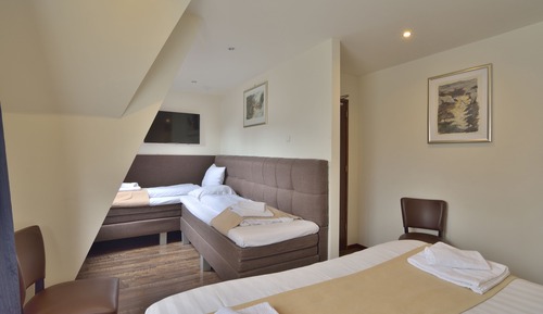 Habitación cuádruple Deluxe