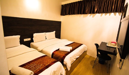 Habitación triple Deluxe