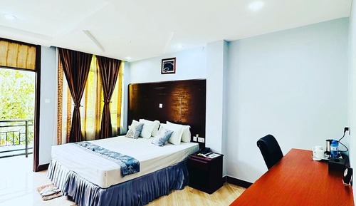 Suite ejecutiva, 1 cama de matrimonio grande, vistas a la montaña