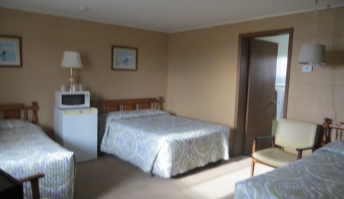 Habitación, varias camas
