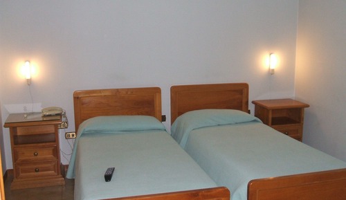 Habitación estándar con 1 cama doble o 2 individuales