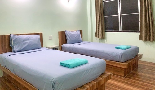 Habitación con 2 camas individuales