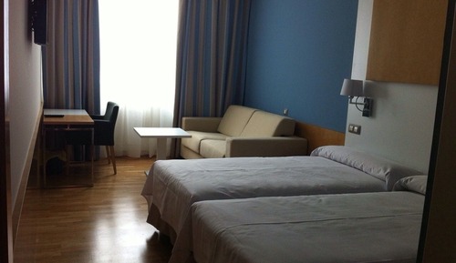 Habitación estándar con 1 cama doble o 2 individuales
