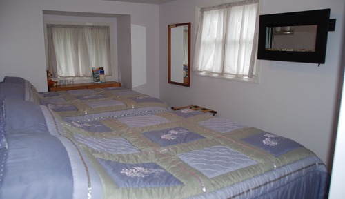 Habitación familiar, 2 camas de matrimonio, baño compartido