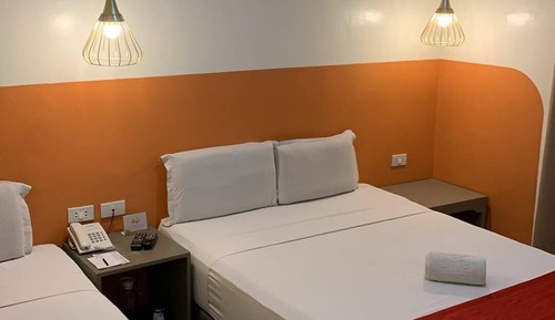 Habitación Deluxe, varias camas