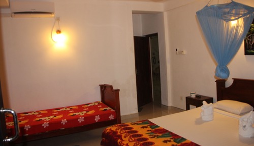 Habitación triple Deluxe