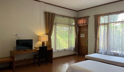 Habitación Deluxe con 2 camas individuales, vistas al jardín