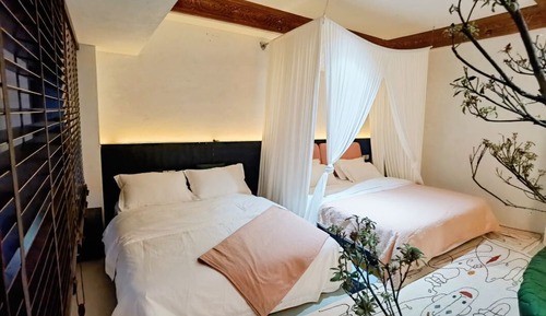 Habitación familiar con 2 camas individuales, vistas a la ciudad