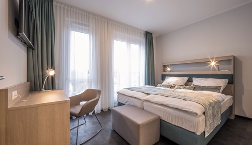 Habitación Confort con 1 cama doble o 2 individuales