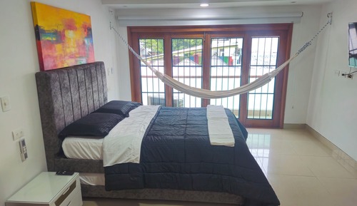 Habitación Deluxe con 1 cama doble o 2 individuales, balcón, vistas a la ciudad