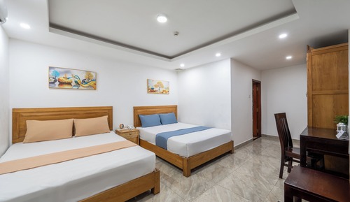 Habitación familiar con 2 camas individuales, vistas a la ciudad