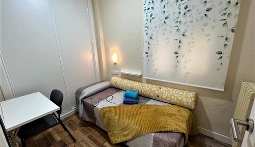 Habitación individual, baño compartido