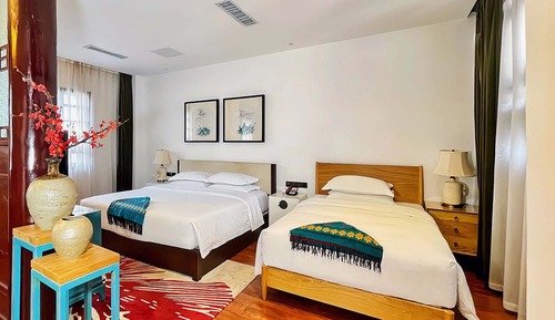 Habitación triple familiar, vistas al jardín