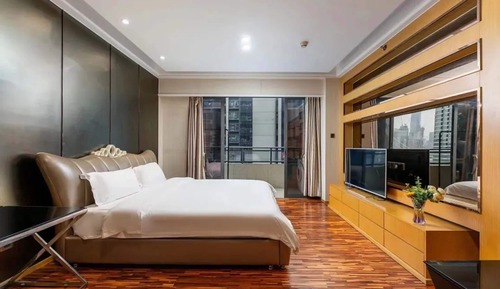 Habitación superior con 2 camas individuales, vistas a la ciudad