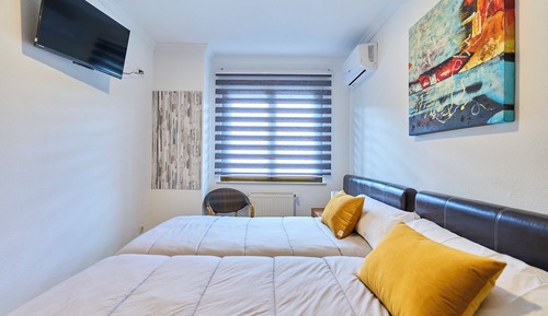 Habitación estándar con 2 camas individuales, balcón, vistas a la ciudad