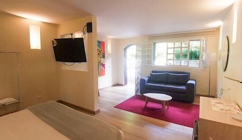Habitación cuádruple Deluxe, vistas a la piscina