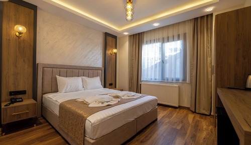 Habitación Deluxe con 1 cama doble o 2 individuales, vistas a la ciudad