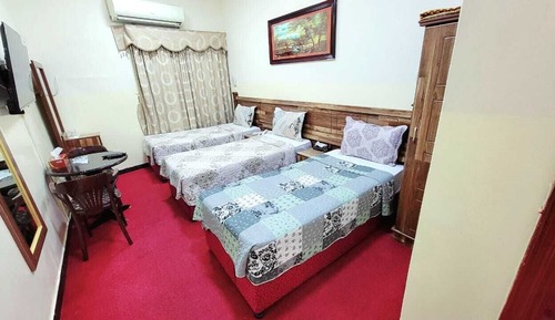 Habitación triple Deluxe