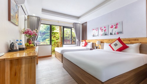 Habitación triple Deluxe, balcón, vistas al jardín