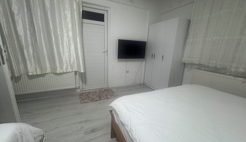 Habitación, varias camas