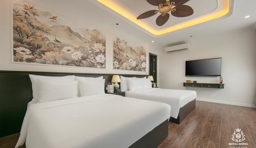Habitación cuádruple Deluxe, varias camas, vistas a la ciudad